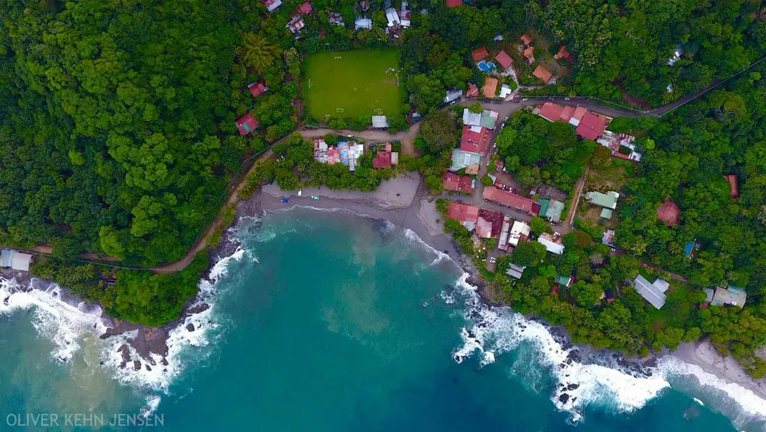 Aerial view of Montezuma village and its rocky coastline